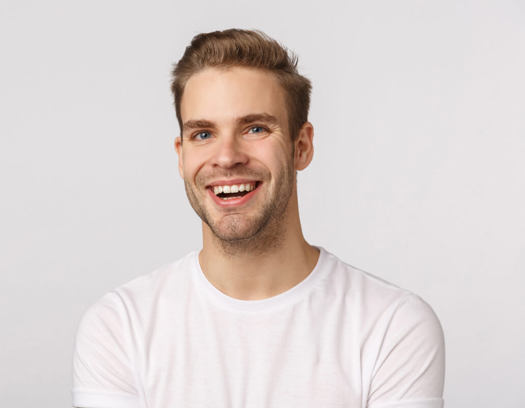 Handsome Blond Guy With Blue Eyes White T Shirt Smiling 1